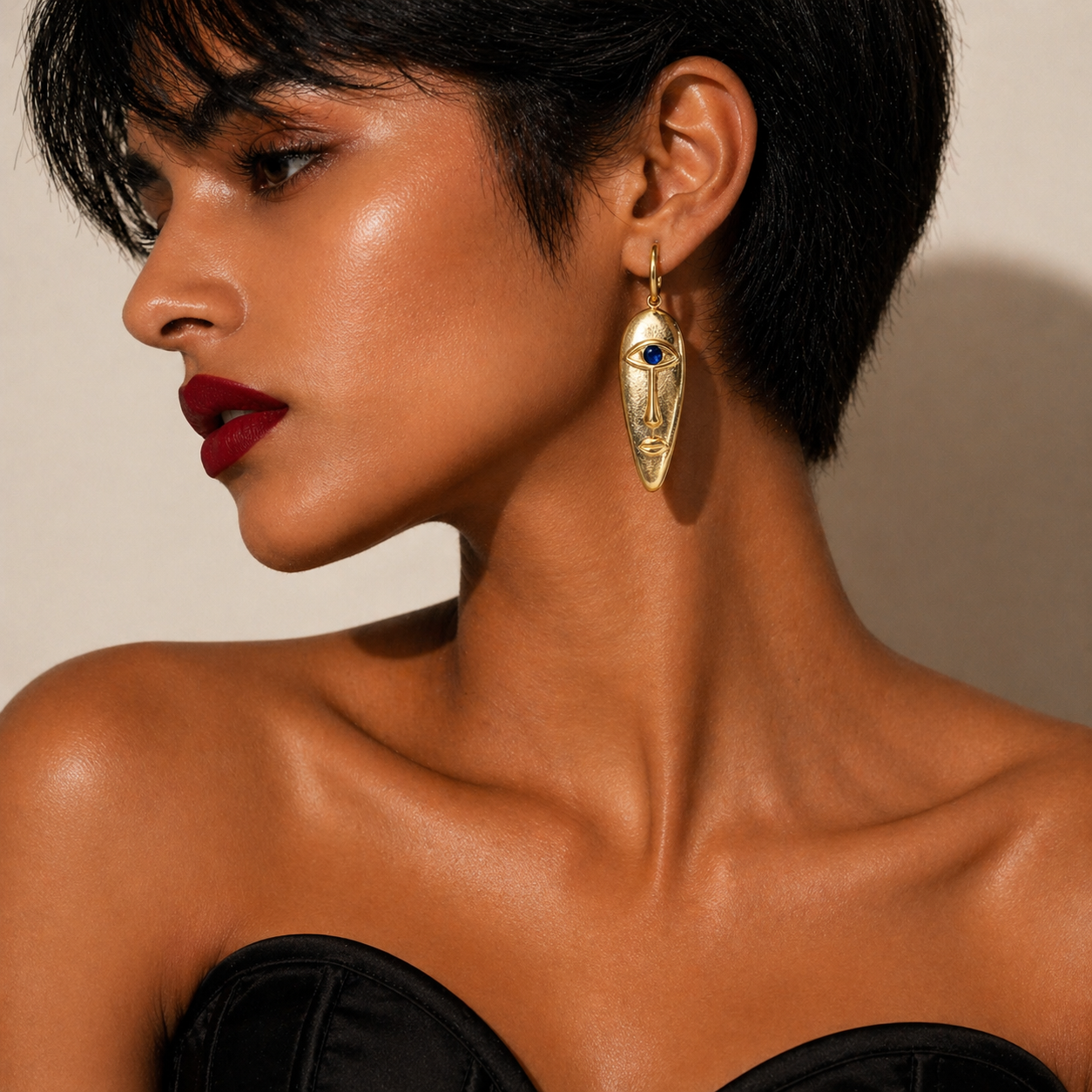 Still Processing Gold Drop Face Earrings