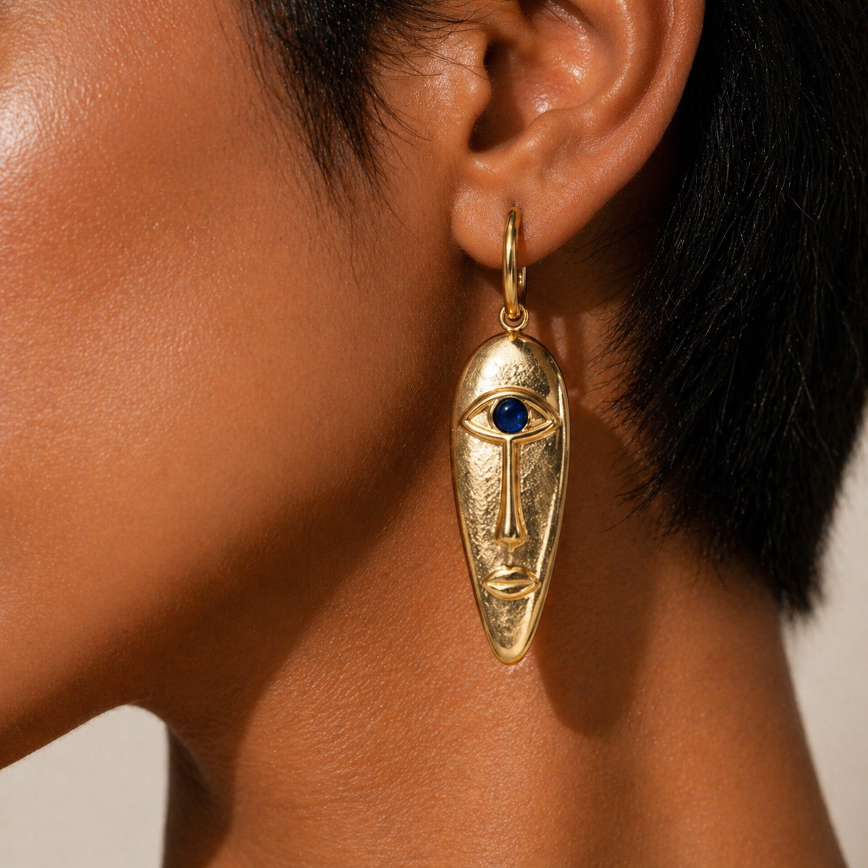 Still Processing Gold Drop Face Earrings